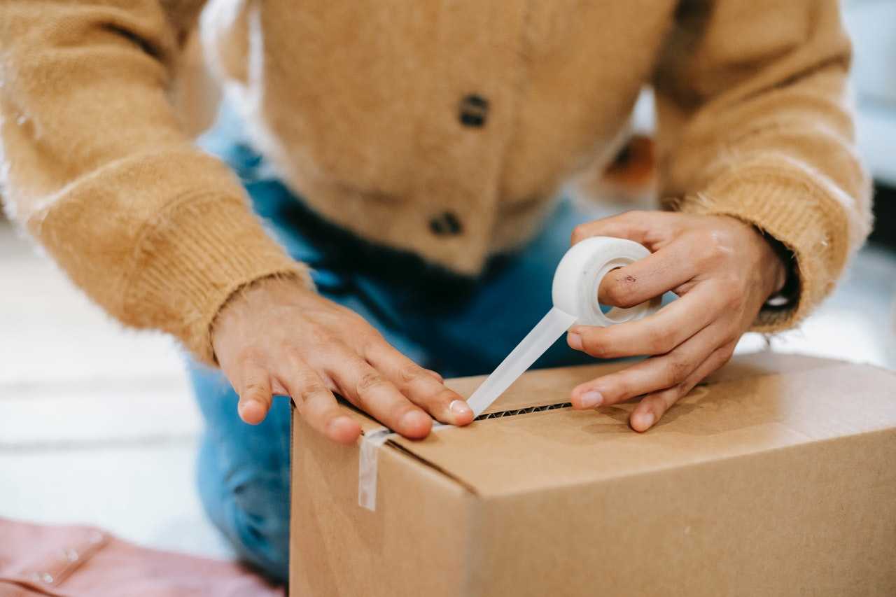 woman packing a box