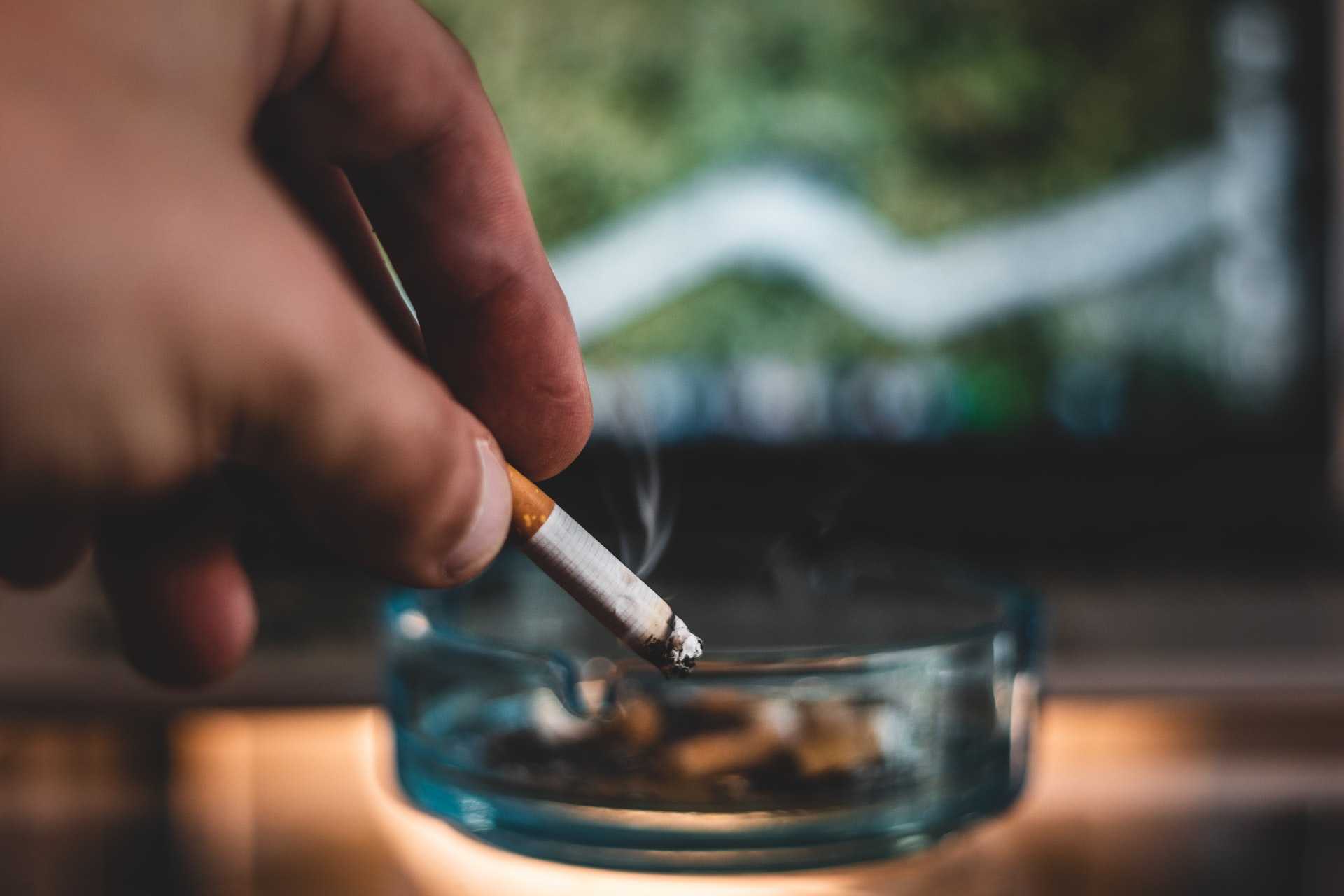 Person holding a cigarette
